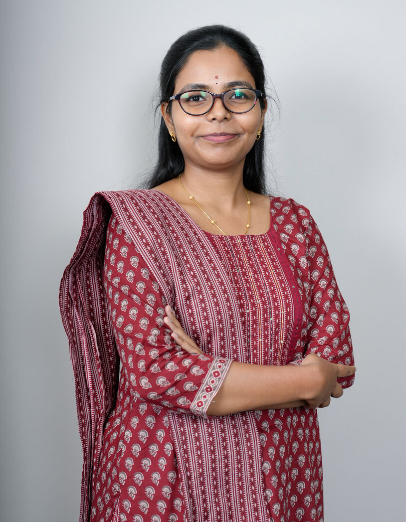 Ms. Dhinisha